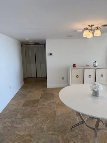 a view of kitchen and a kitchen island