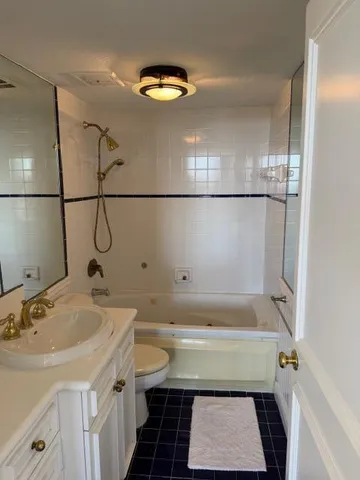 a bathroom with a sink and a bathtub