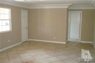718 Teakwood Street Oxnard, CA 93033 - Photo 2 of 15 an empty room with windows
