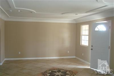 718 Teakwood Street Oxnard, CA 93033 - Photo 4 of 15 a view of an empty room with a window