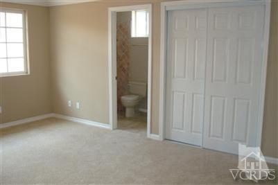 718 Teakwood Street Oxnard, CA 93033 - Photo 9 of 15 an empty room with windows