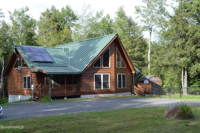 a view of a bathroom with a window and a shower