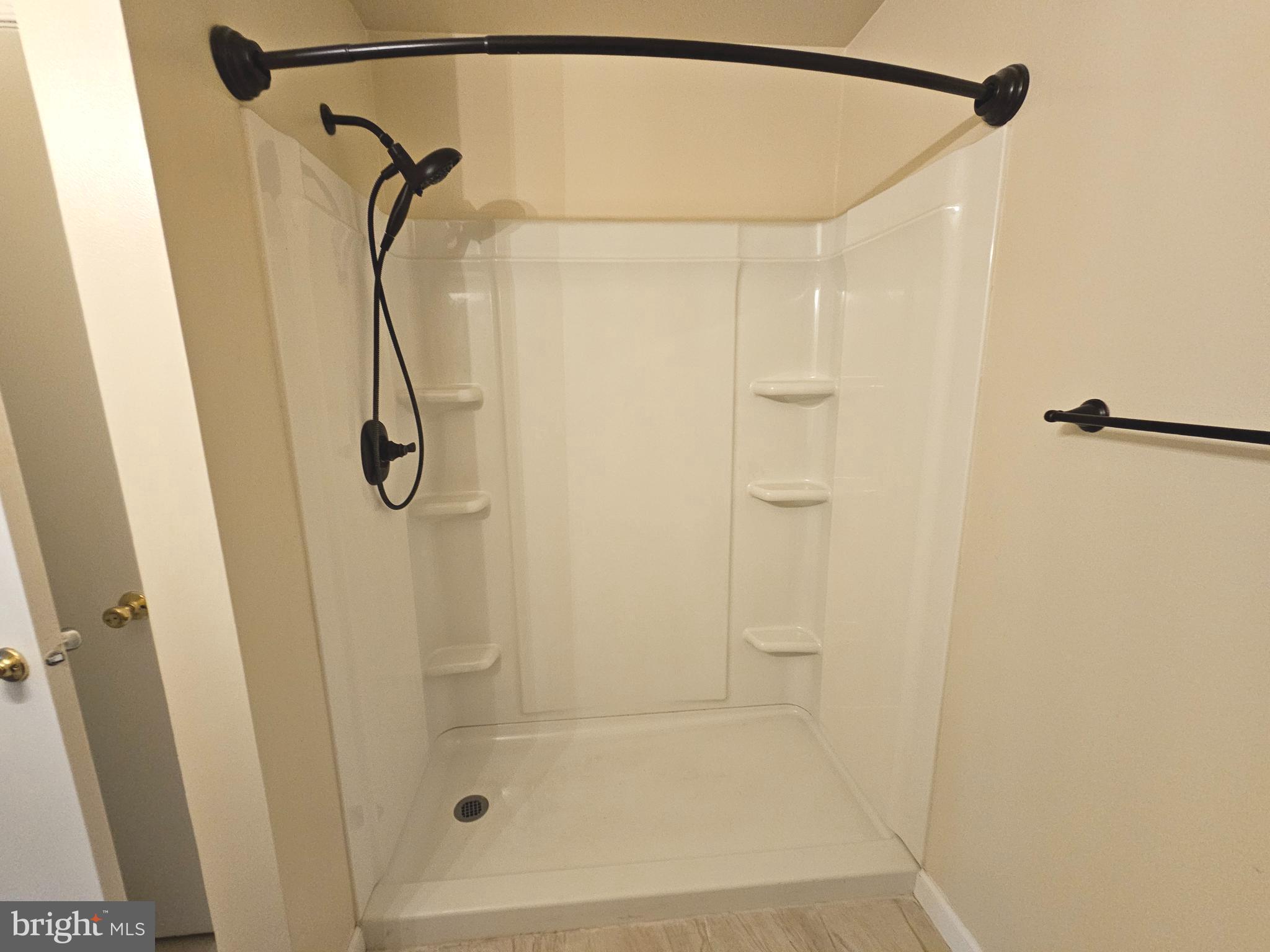 7 Gristmill Drive Dover, DE 19904 - Photo 14 of 26 a bathroom with a shower