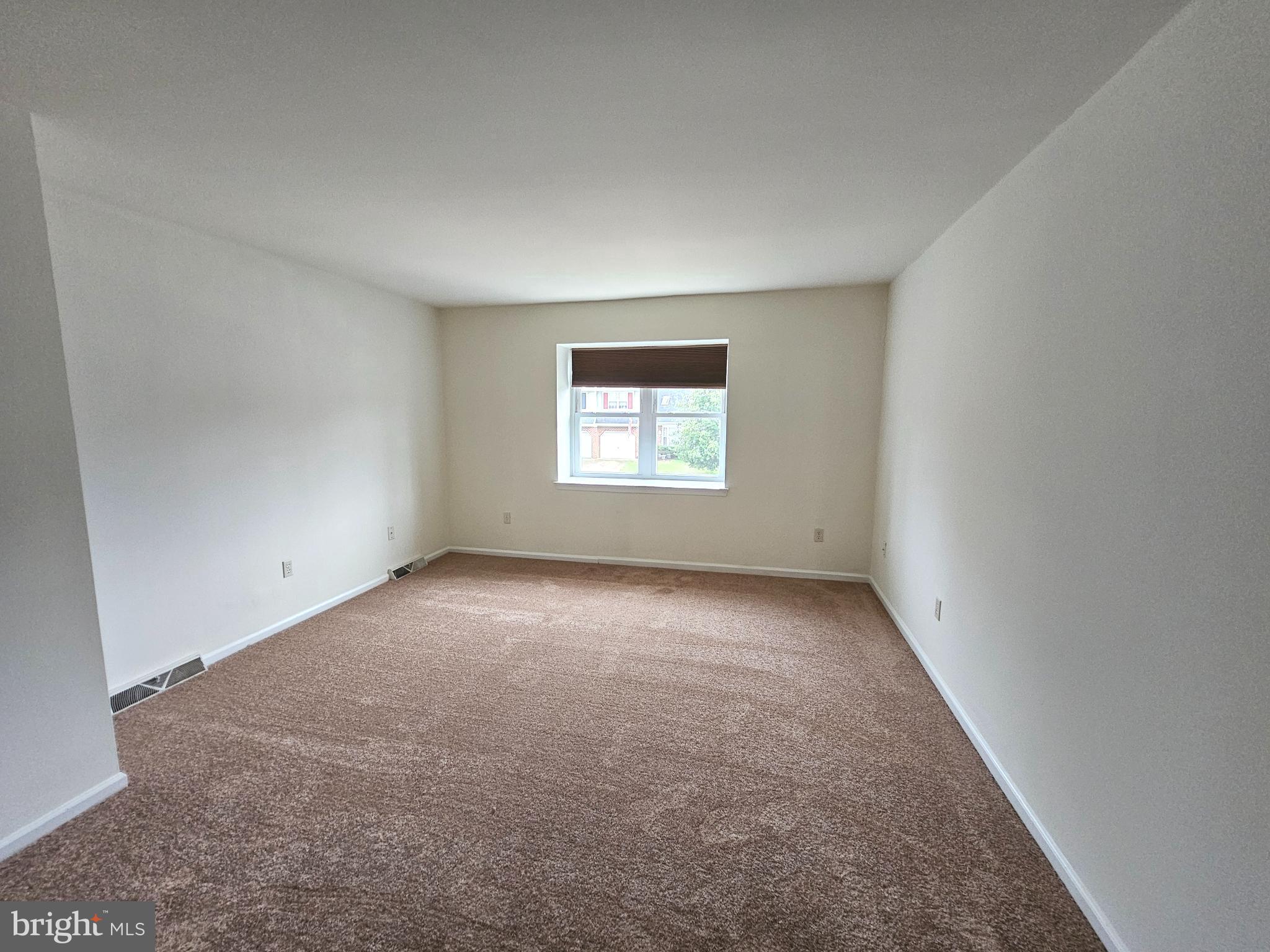 7 Gristmill Drive Dover, DE 19904 - Photo 15 of 26 an empty room with a window