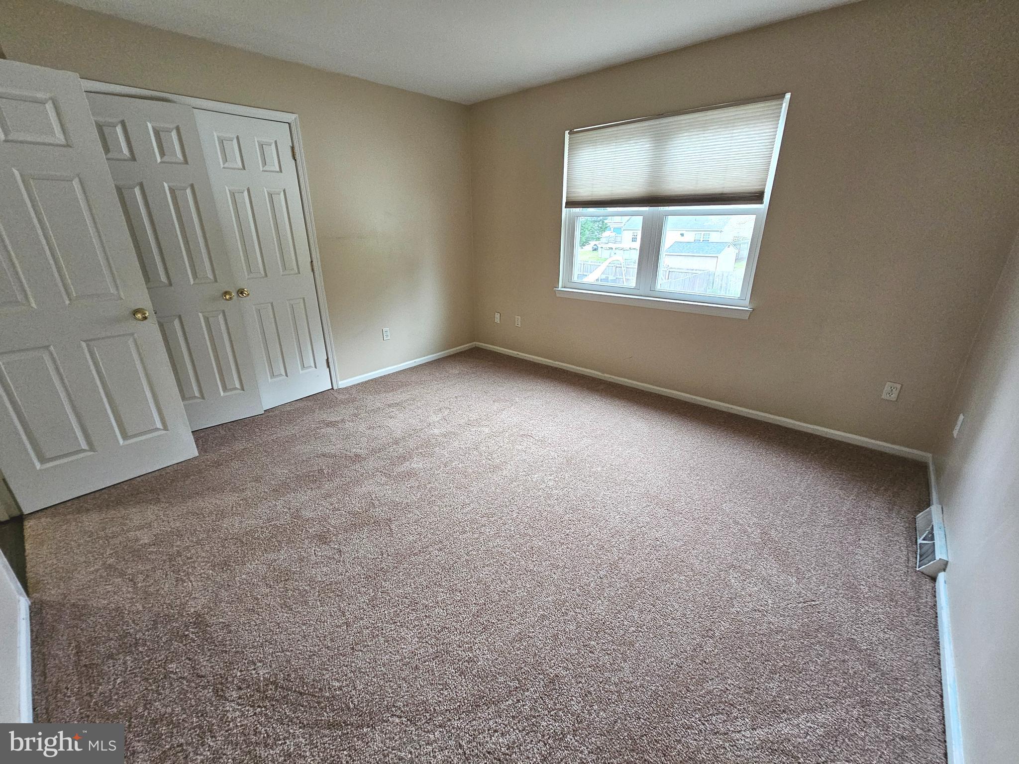 7 Gristmill Drive Dover, DE 19904 - Photo 17 of 26 an empty room with windows