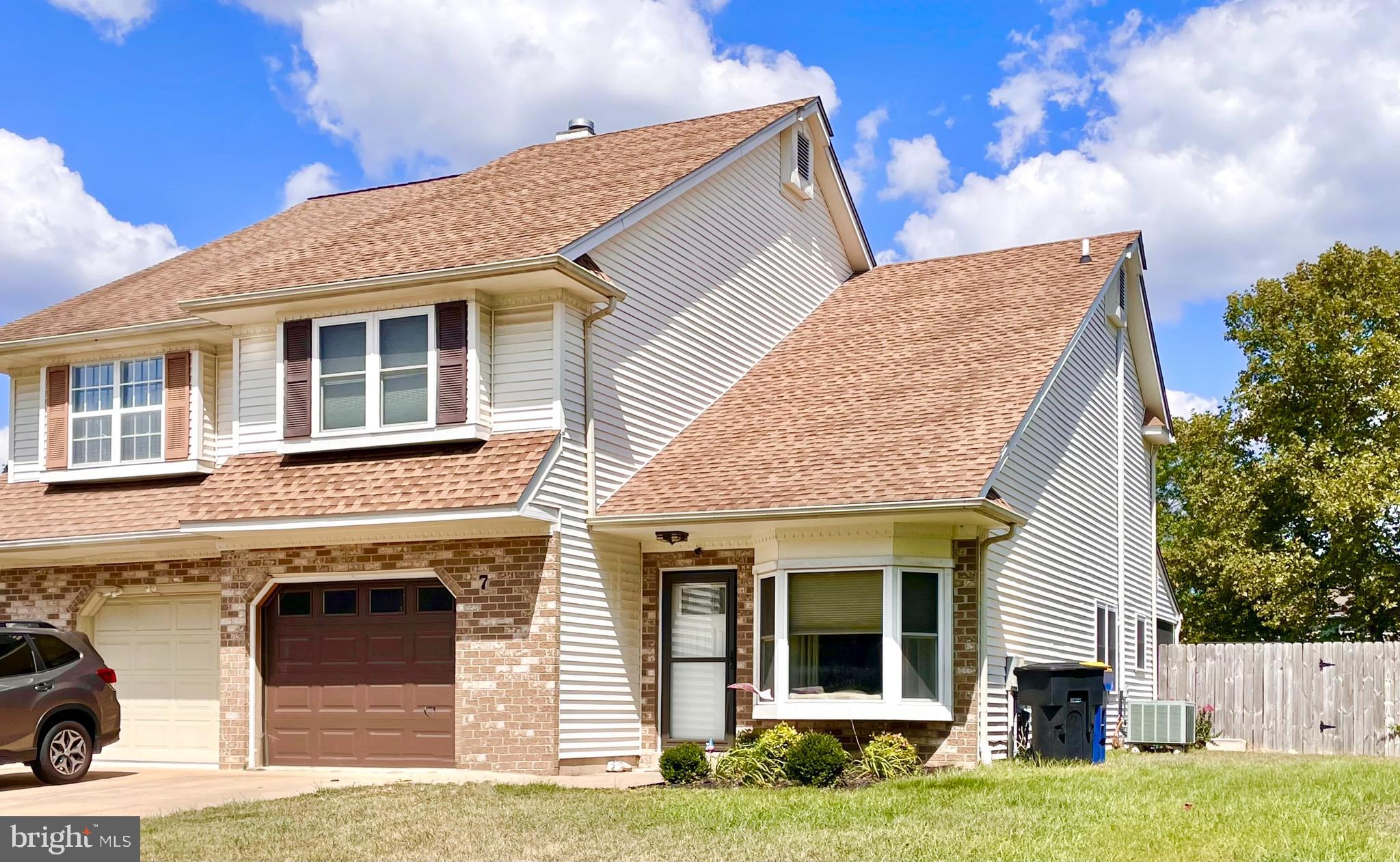 7 Gristmill Drive Dover, DE 19904 - Photo 2 of 26 a front view of a house with a yard