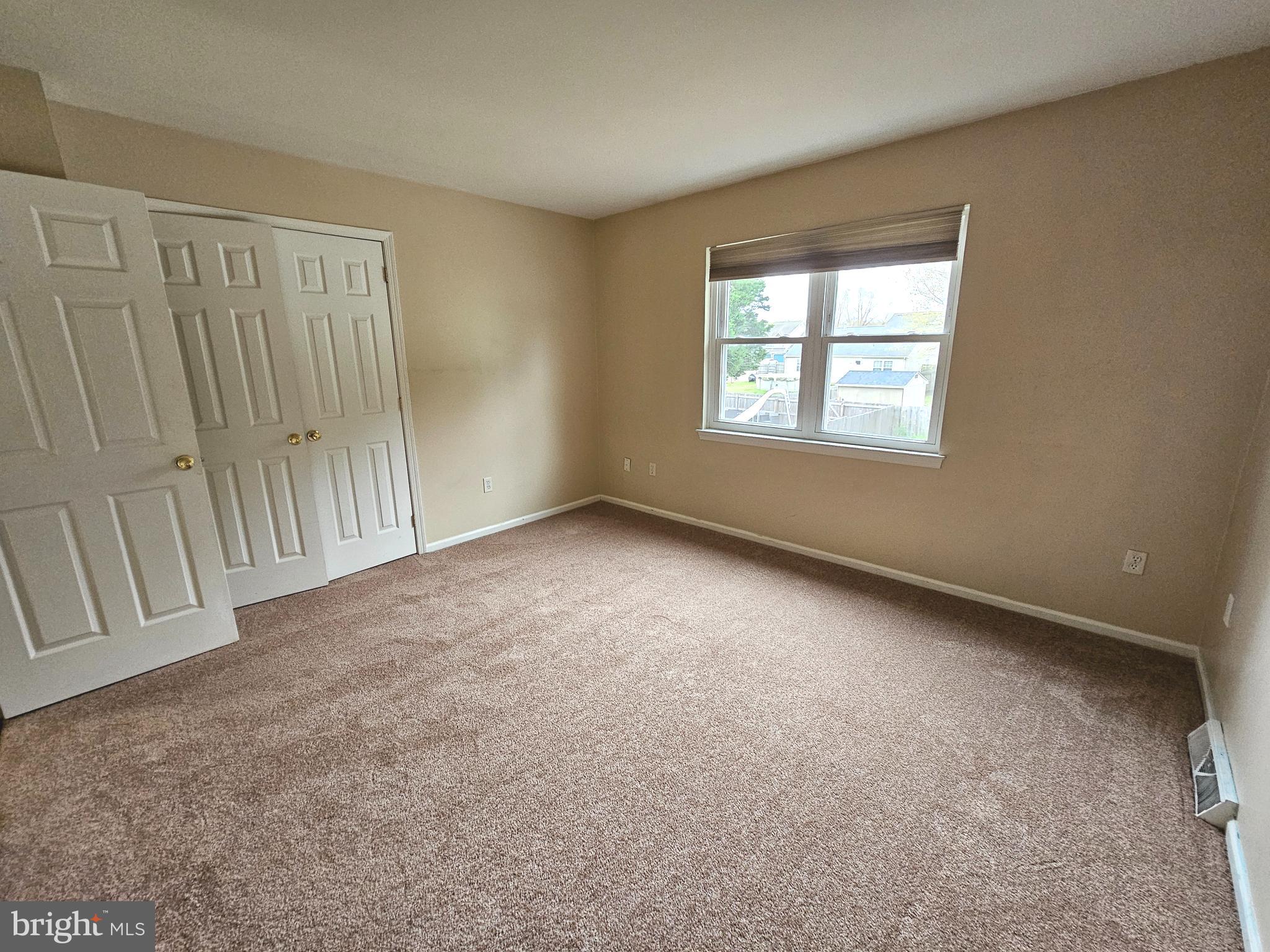 7 Gristmill Drive Dover, DE 19904 - Photo 22 of 26 an empty room with windows