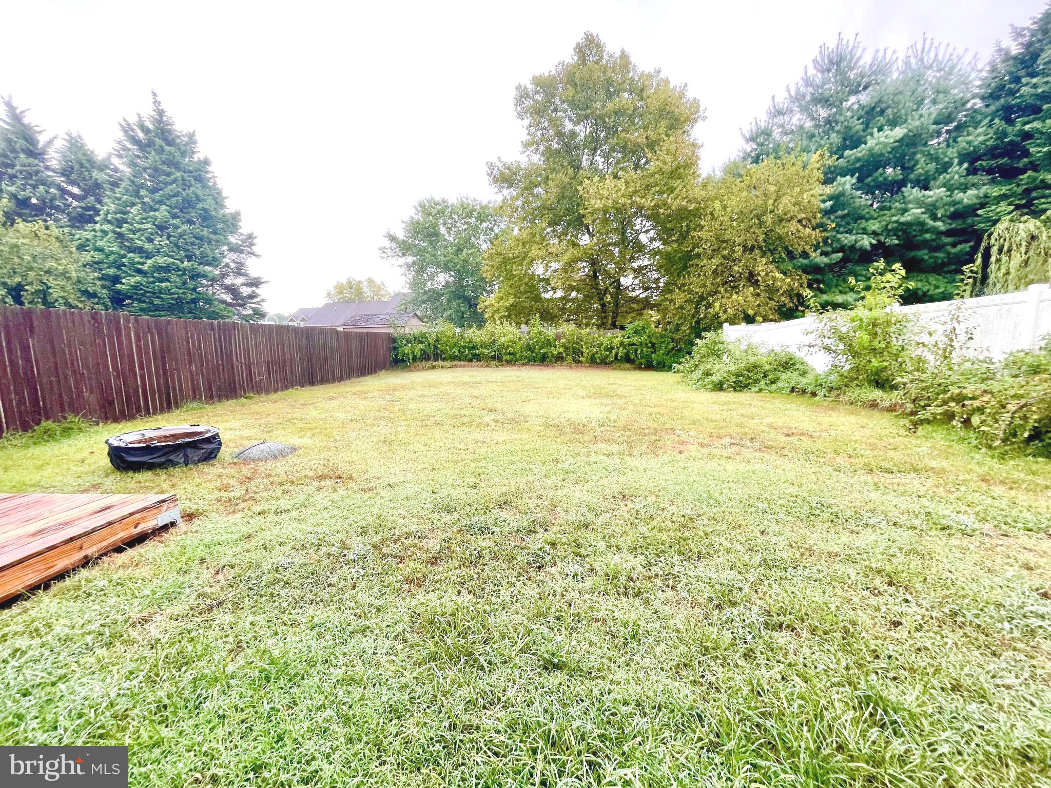 7 Gristmill Drive Dover, DE 19904 - Photo 26 of 26 a view of a backyard of the house