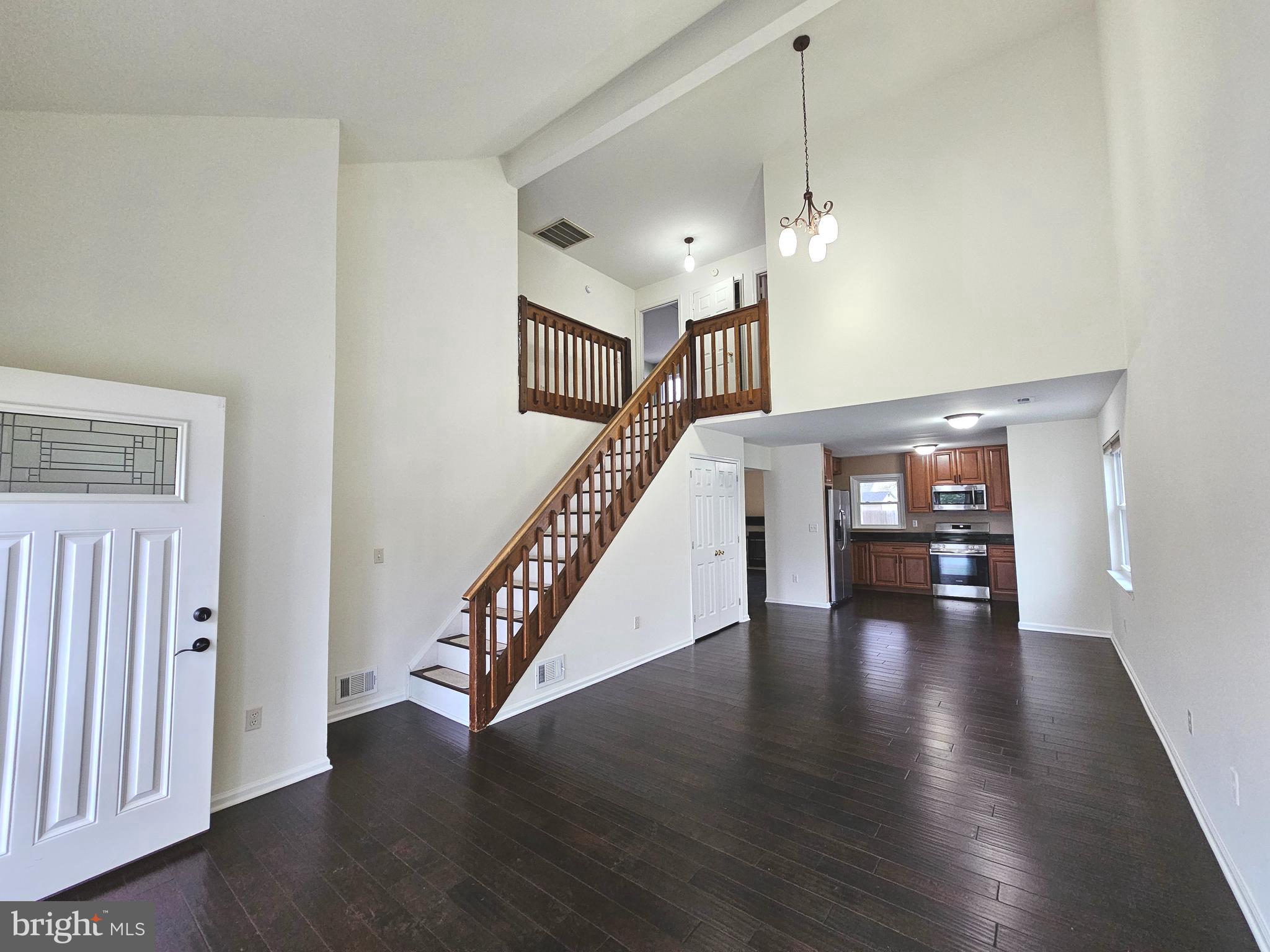 7 Gristmill Drive Dover, DE 19904 - Photo 3 of 26 a view of an entryway with wooden floor