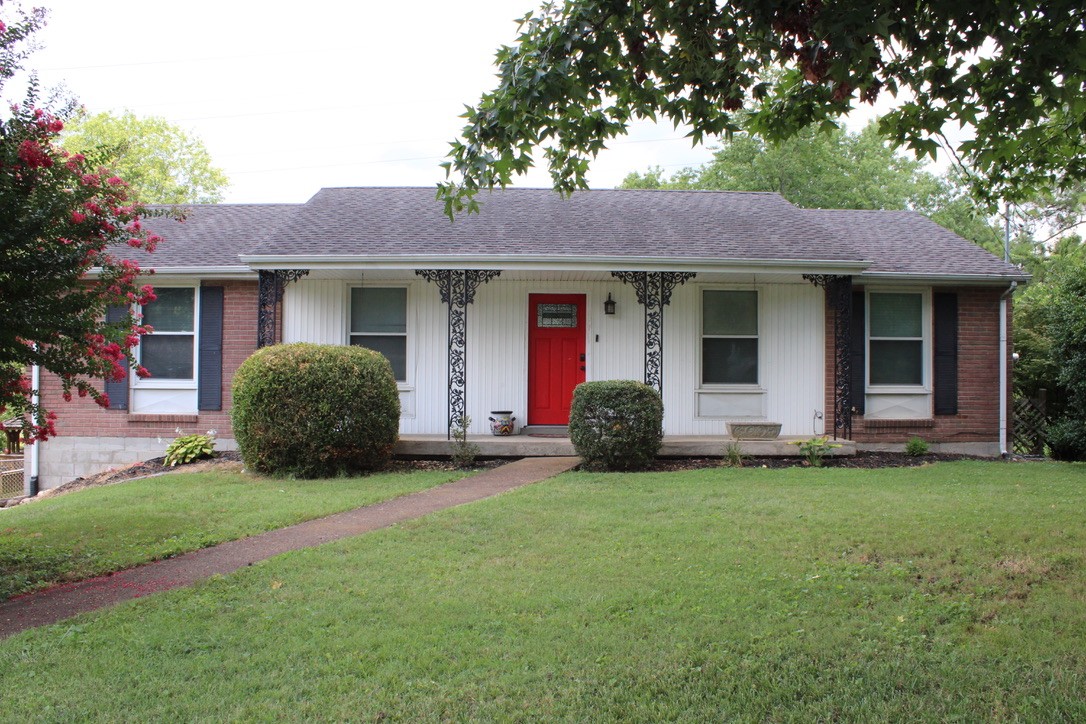 303 Gates Road Goodlettsville, TN 37072 - Photo 1 of 19 a view of a house with a yard and garage
