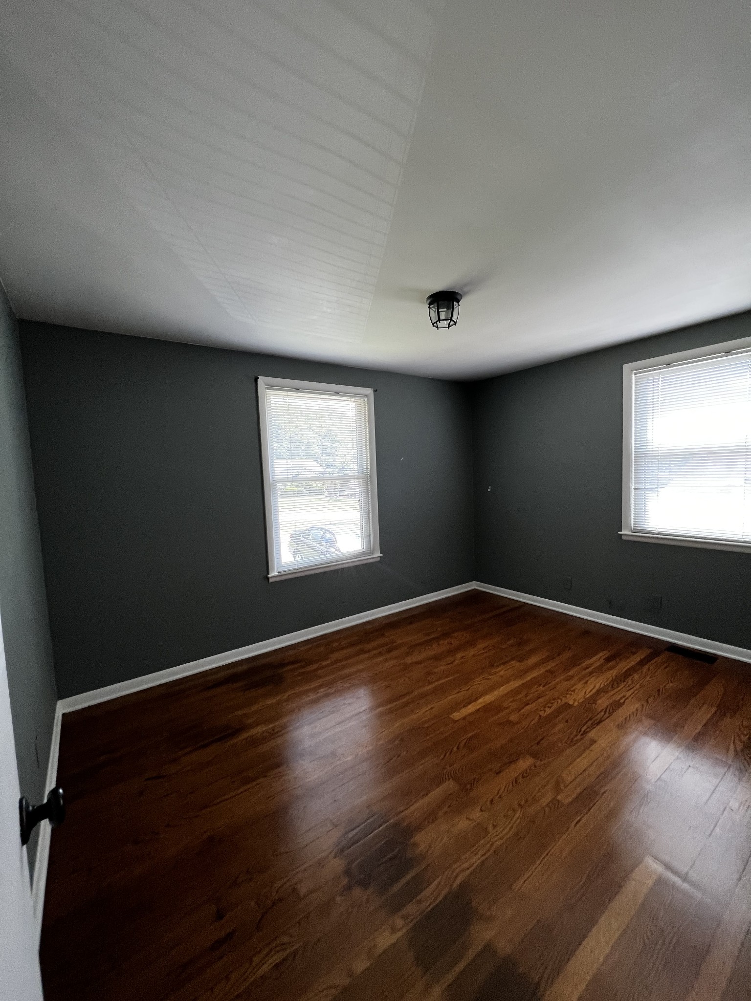 303 Gates Road Goodlettsville, TN 37072 - Photo 15 of 19 an empty room with wooden floor and windows