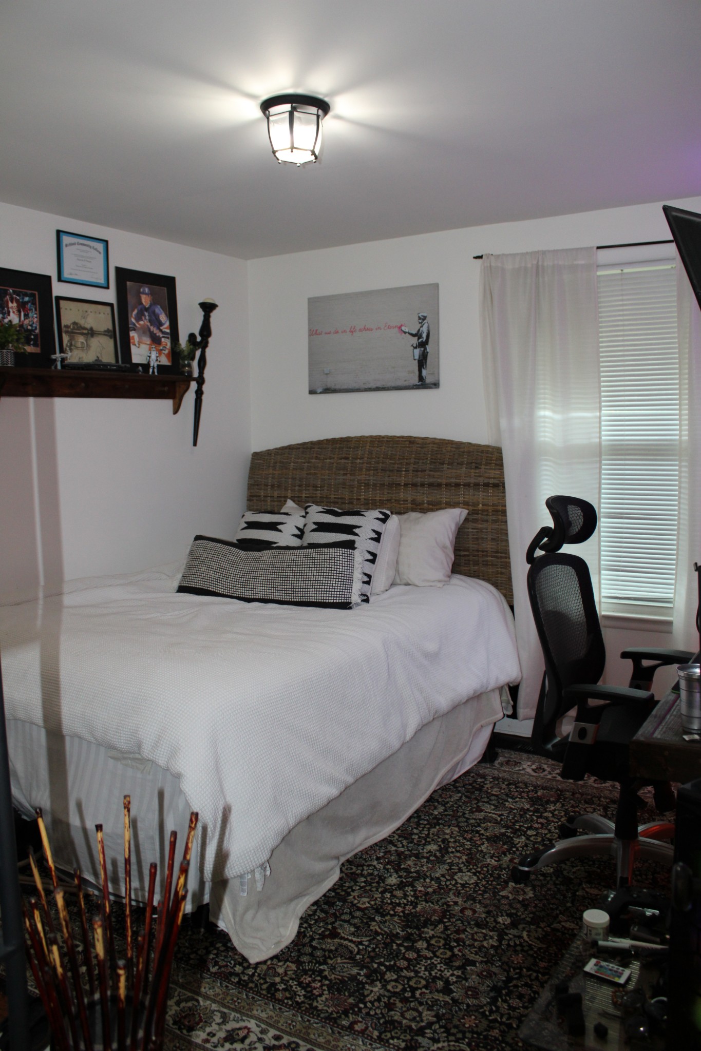 303 Gates Road Goodlettsville, TN 37072 - Photo 17 of 19 a bedroom with a bed and potted plants on the dresser
