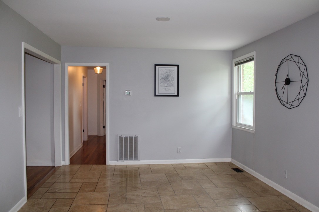 303 Gates Road Goodlettsville, TN 37072 - Photo 7 of 19 a view of a hallway with windows