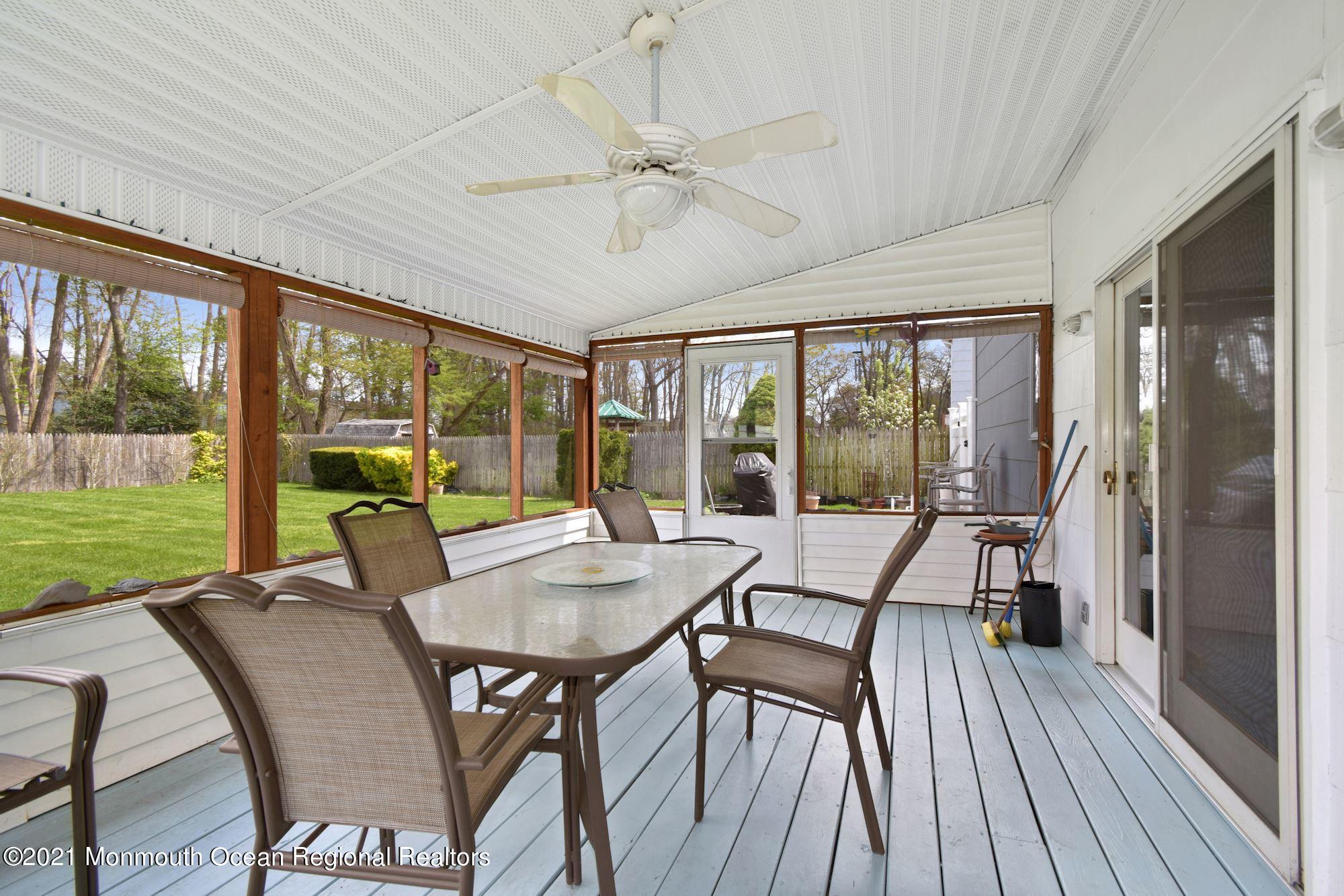 20 Bunkerhill Road Hazlet, NJ 07730 - Photo 21 of 27 a view of a dining room with furniture window and outside view