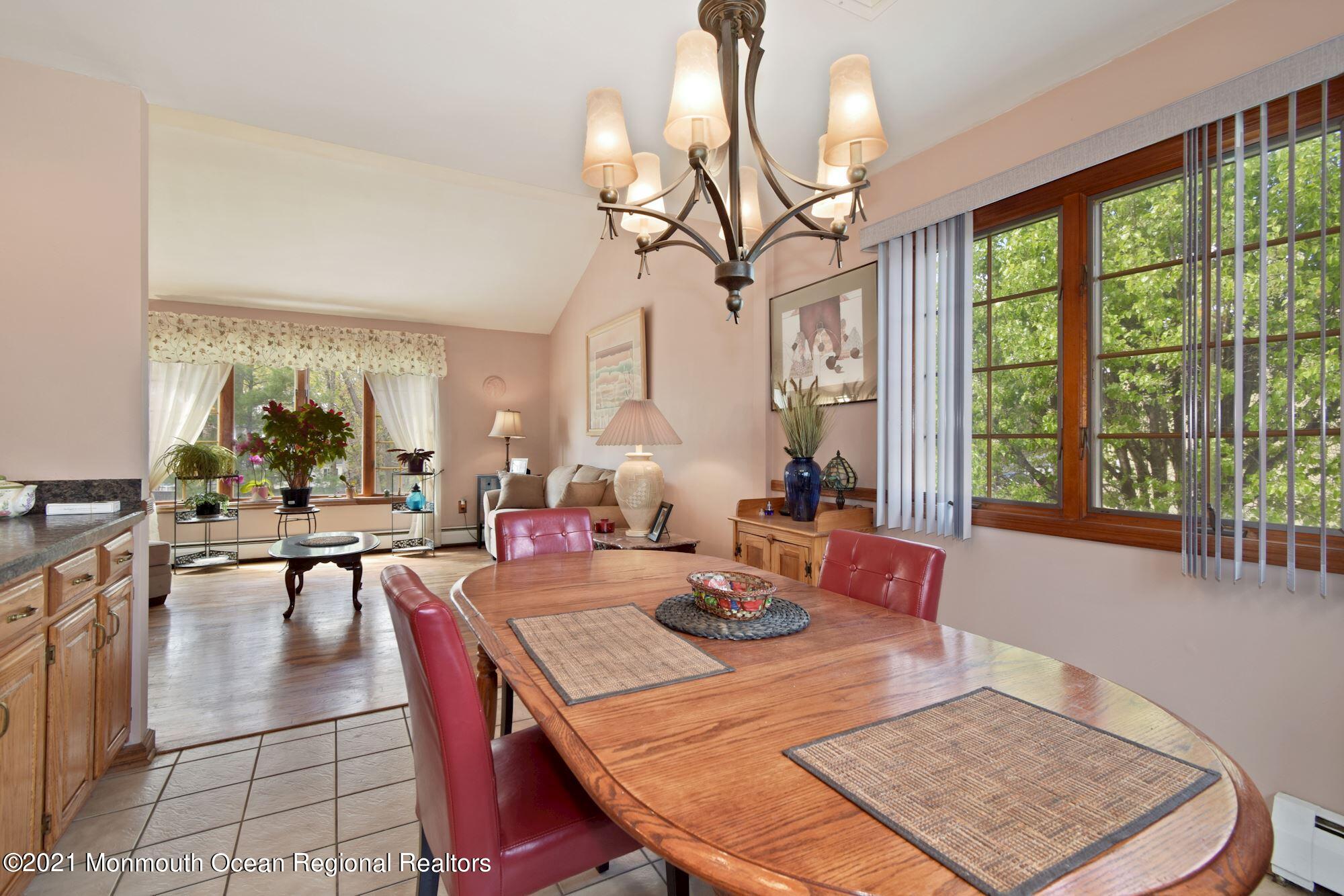 20 Bunkerhill Road Hazlet, NJ 07730 - Photo 6 of 27 a view of a dining room with furniture window and wooden floor