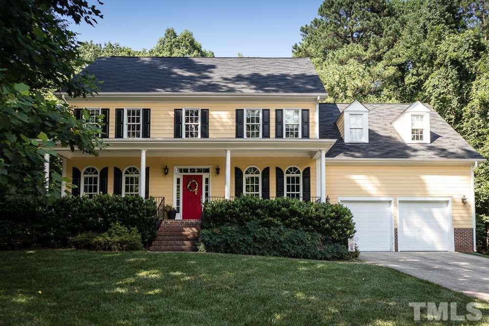 5016 Big Creek Road Raleigh, NC 27613 - Photo 1 of 25 a front view of house with yard and green space