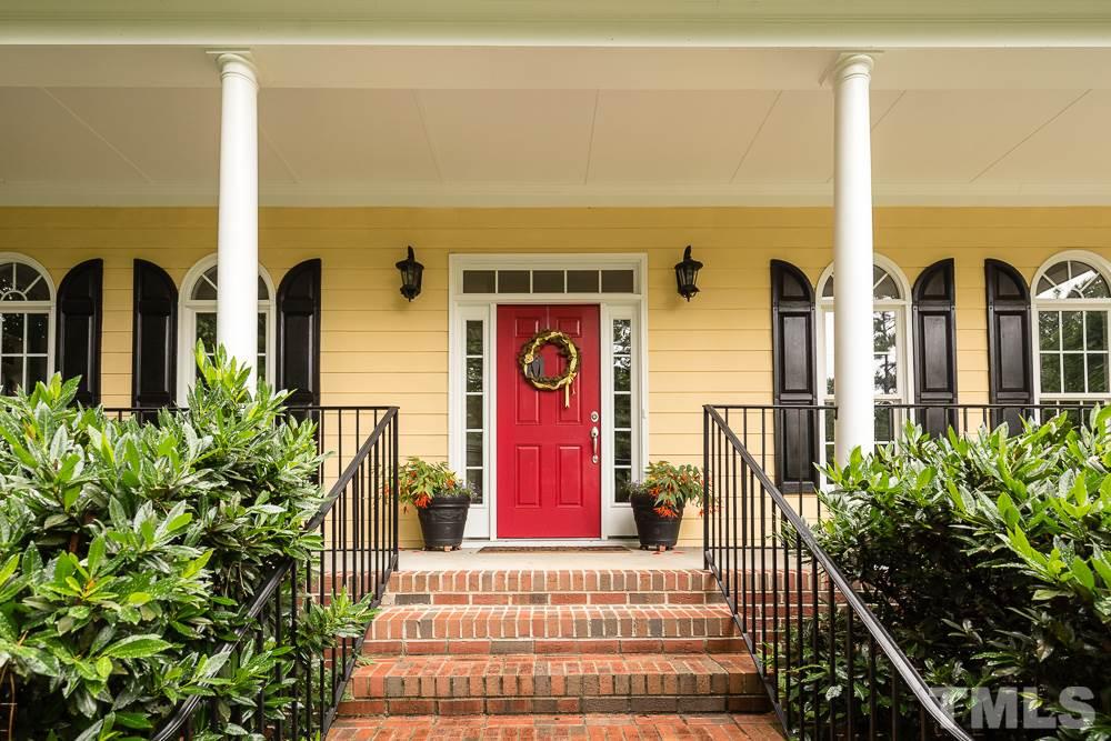 5016 Big Creek Road Raleigh, NC 27613 - Photo 2 of 25 a view of a entryway door of the house