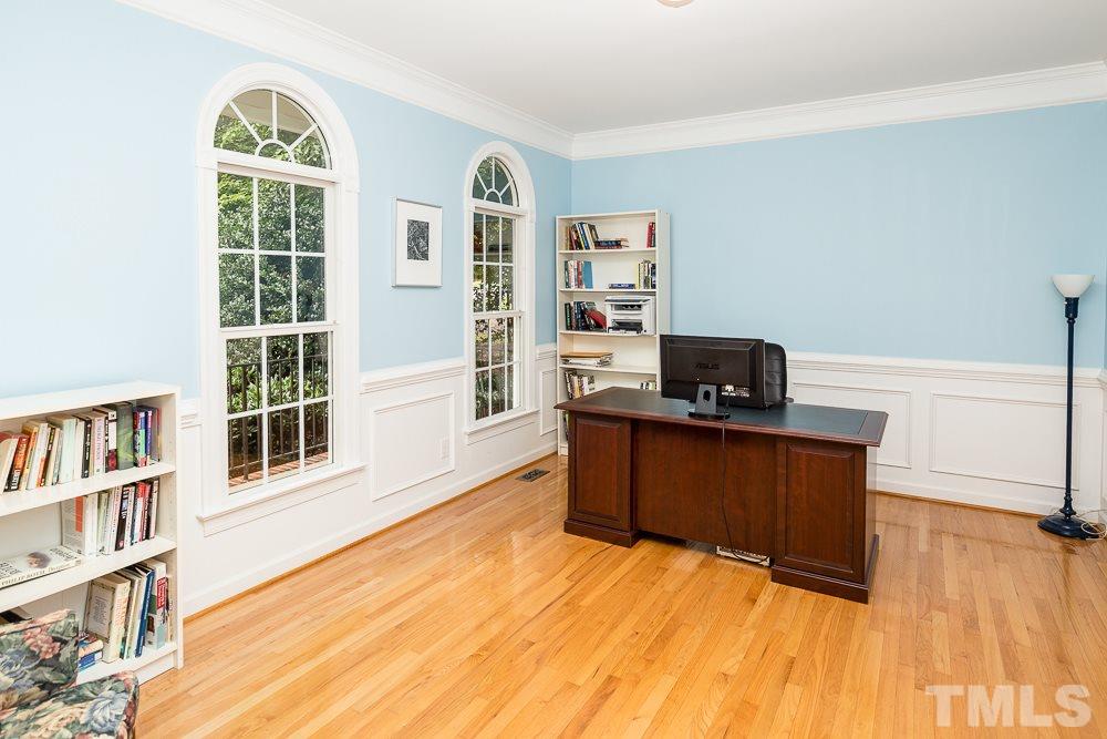 5016 Big Creek Road Raleigh, NC 27613 - Photo 3 of 25 a bedroom with a bed and a window