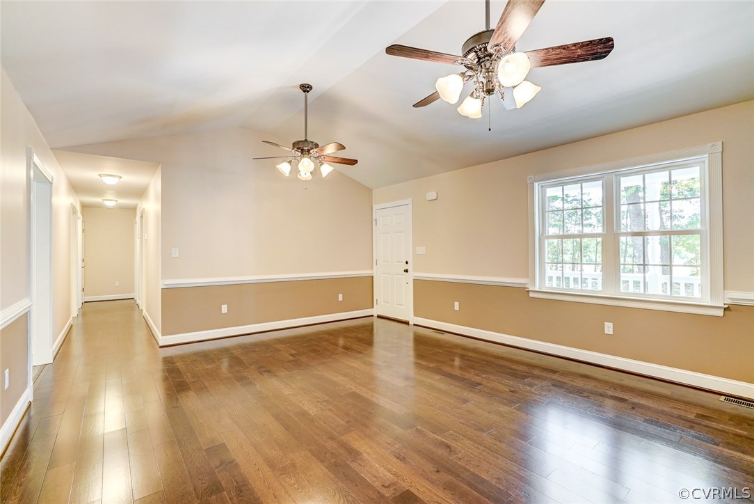 13521 Courthouse Road Dinwiddie, VA 23841 - Photo 8 of 35 a view of an empty room with a window and wooden floor
