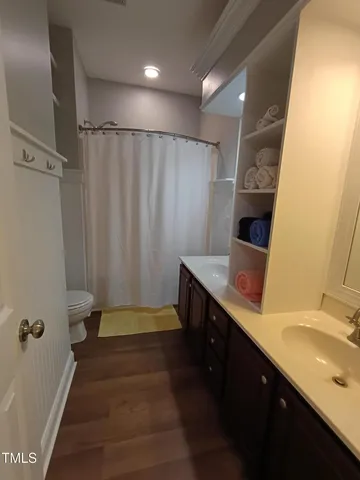 a view of a hallway with workspace