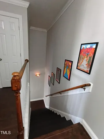 a view of a patio with a table and chairs
