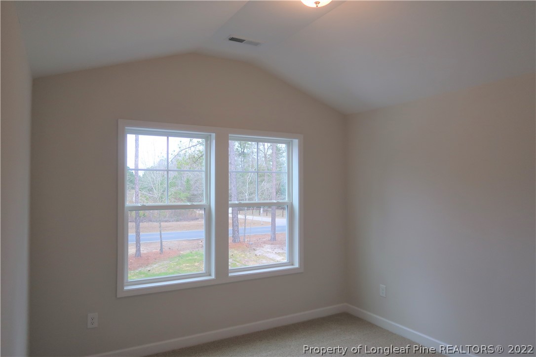 975 Montrose Road Raeford, NC 28376 - Photo 12 of 18 an empty room with a window
