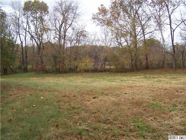 990 Childers Road Cleveland, NC 27013 - Photo 7 of 7 a view of a big yard with trees