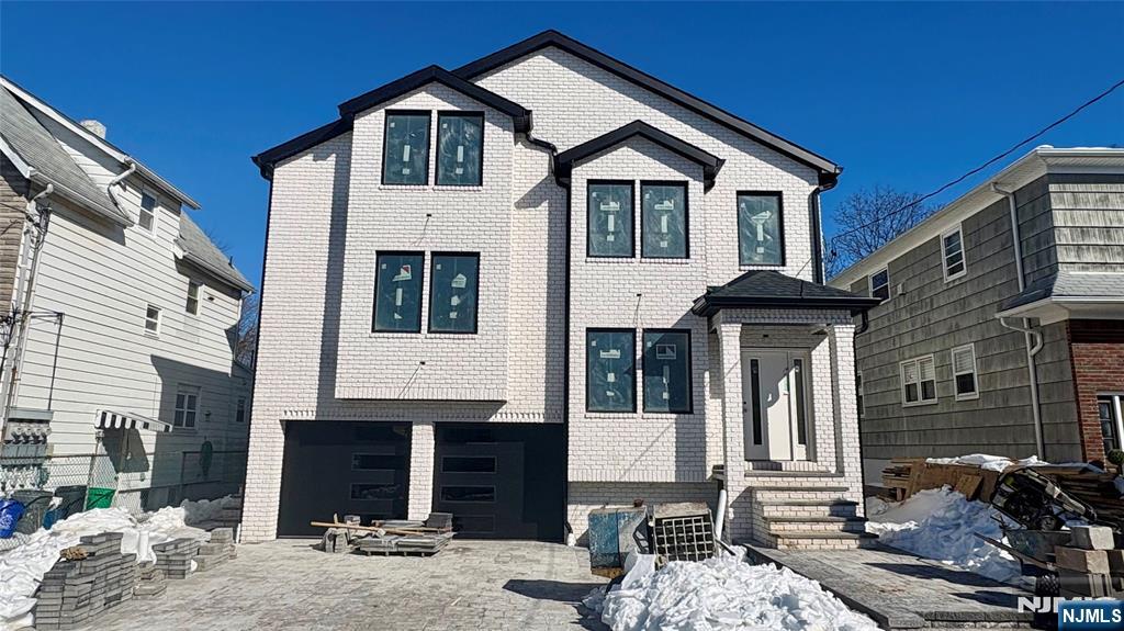 539 Freeman Street Lyndhurst, NJ 07071 - Photo 1 of 2 a front view of a house with balcony