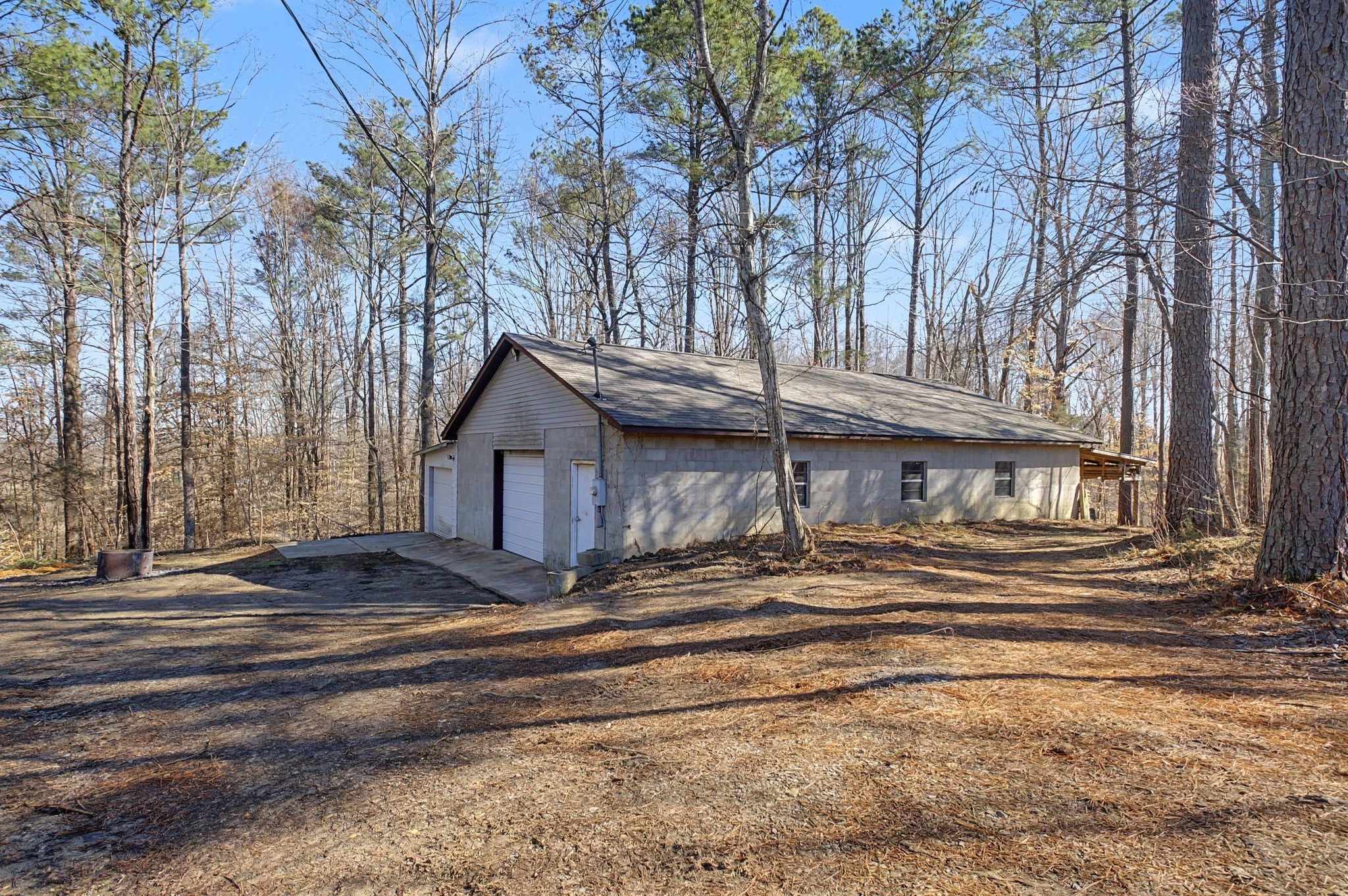 1231 Abiff Road Bon Aqua, TN 37025 - Photo 45 of 60 a house view with a roof deck