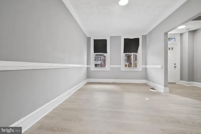 an empty room with windows