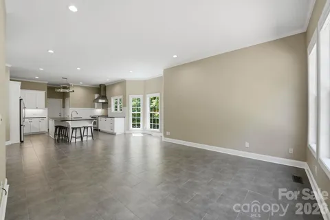 a view of dining room with furniture and wooden floor