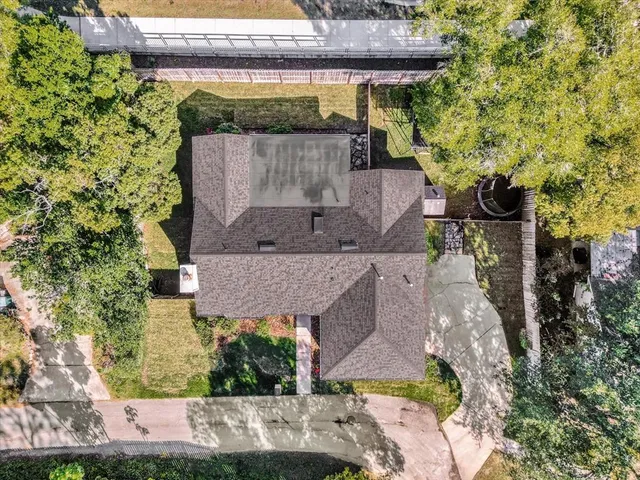 a aerial view of a house with a garden