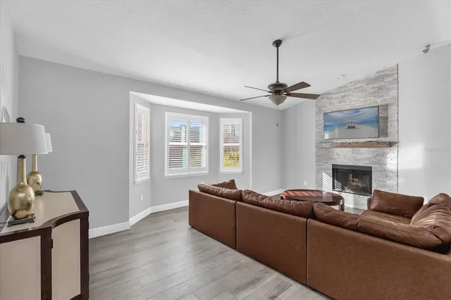 a living room with furniture and a window