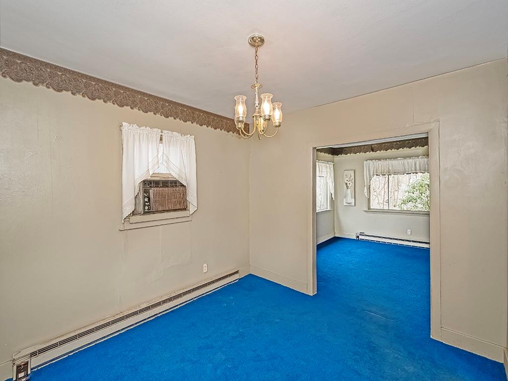 1283 Martin Road Apollo, PA 15613 - Photo 16 of 24 a view of an empty room with window and wooden floor