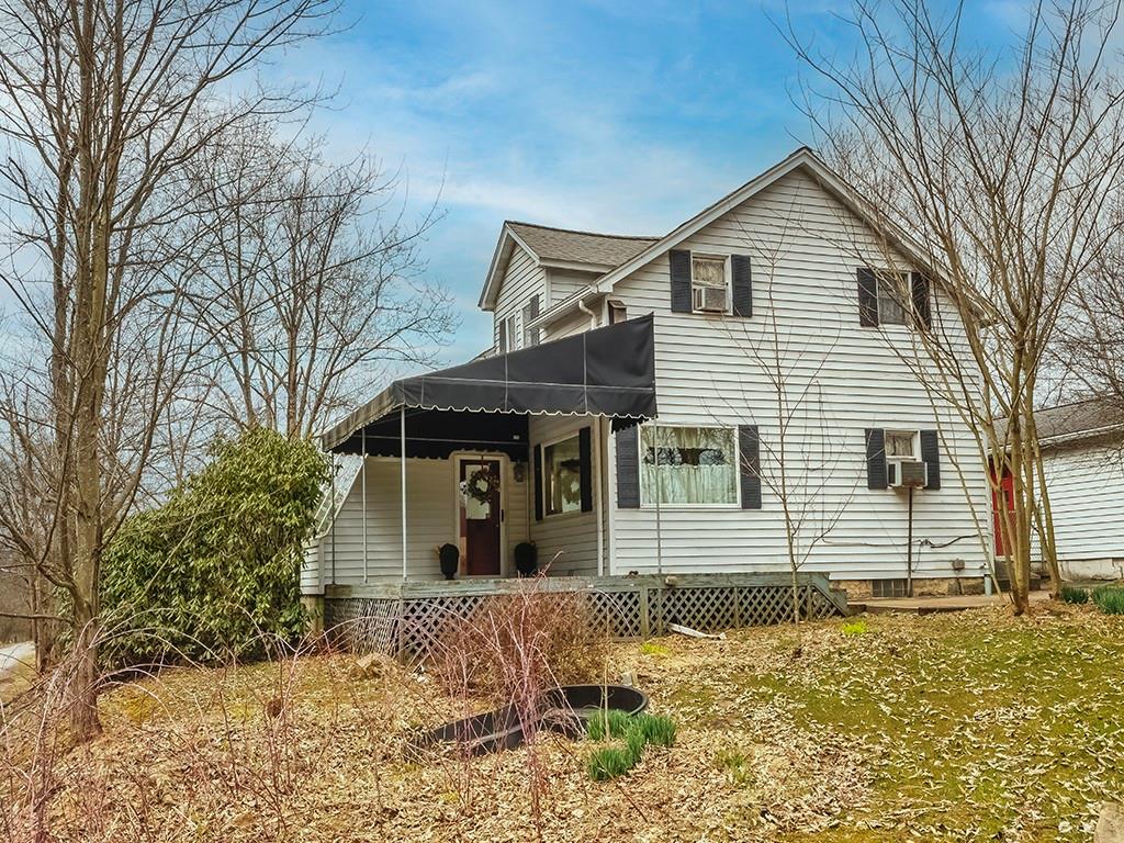 1283 Martin Road Apollo, PA 15613 - Photo 3 of 24 a front view of a house with a yard
