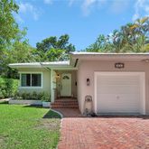 a front view of house with yard