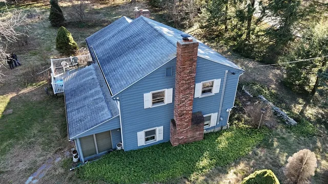 a view of a backyard with plants
