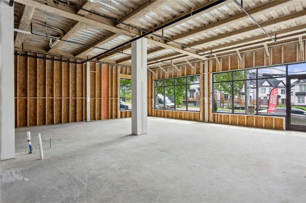 2030 Main Street Northwest, Unit R113 Atlanta, GA 30318 - Photo 4 of 17 a view of an empty room with a sliding door