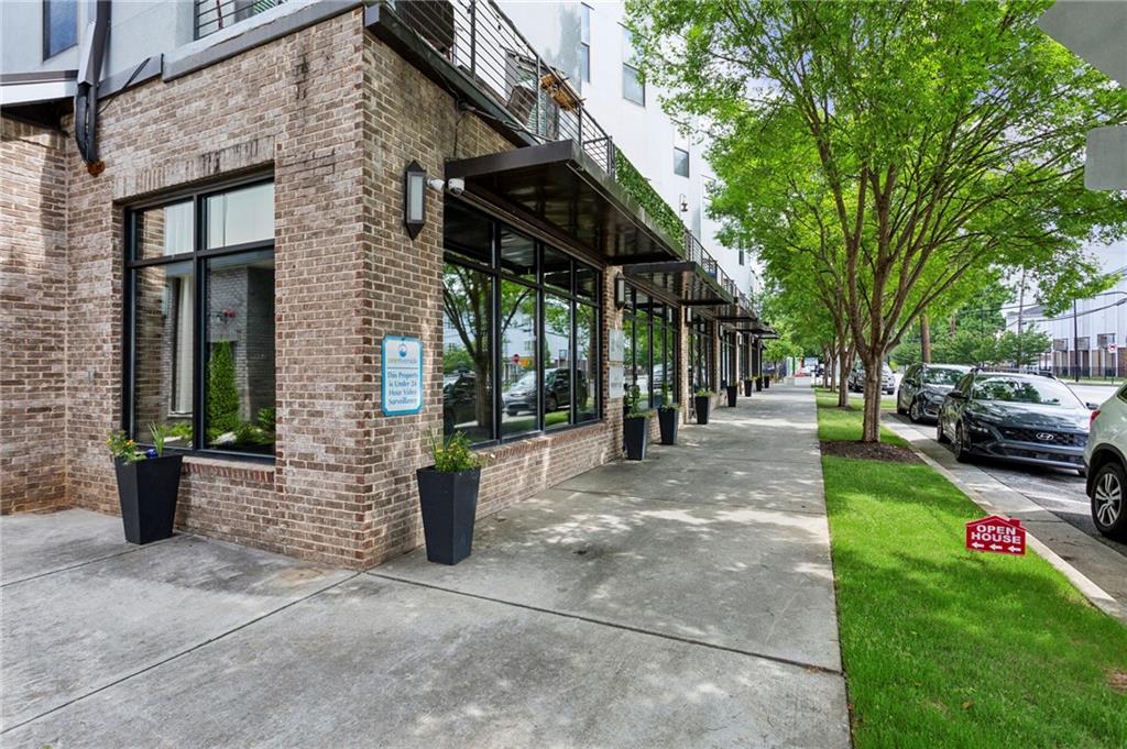 2030 Main Street Northwest, Unit R113 Atlanta, GA 30318 - Photo 6 of 17 a view of a chairs and table in the patio