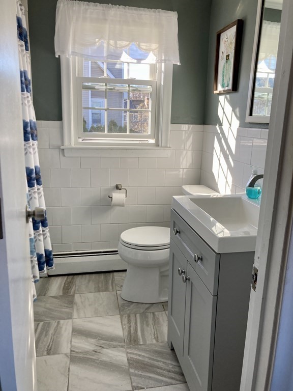 119 Westmoor Road Boston, MA 02132 - Photo 11 of 22 a bathroom with a sink toilet and window