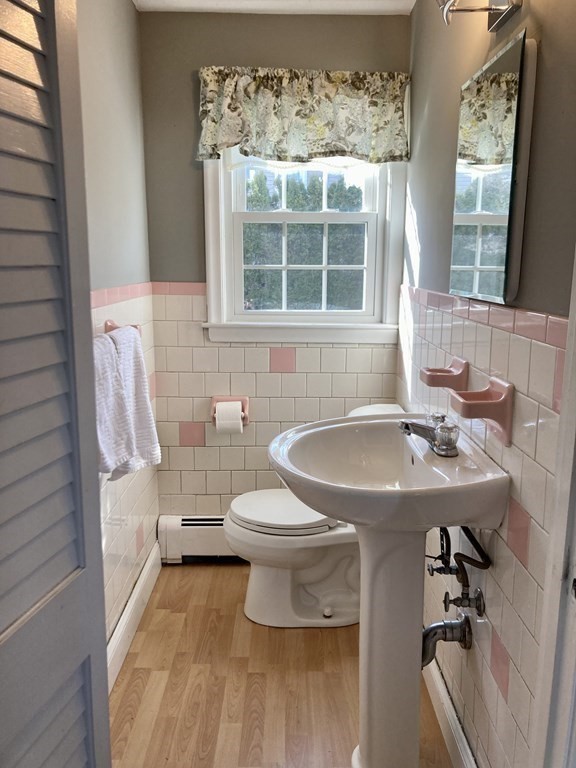 119 Westmoor Road Boston, MA 02132 - Photo 15 of 22 a bathroom with a sink and a toilet