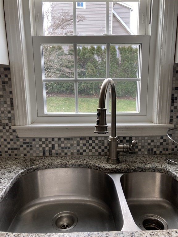 119 Westmoor Road Boston, MA 02132 - Photo 21 of 22 a kitchen with a sink and a window