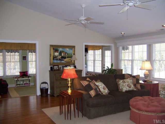 3122 Georgian Terrace Raleigh, NC 27607 - Photo 8 of 12 a living room with furniture and a large window