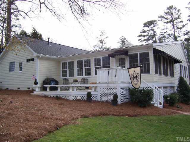 3122 Georgian Terrace Raleigh, NC 27607 - Photo 10 of 12 a front view of a house with a porch