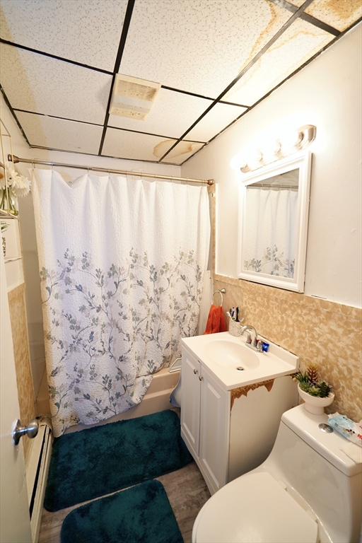 183 Farnham Street Lawrence, MA 01843 - Photo 19 of 38 a bathroom with a sink and a mirror