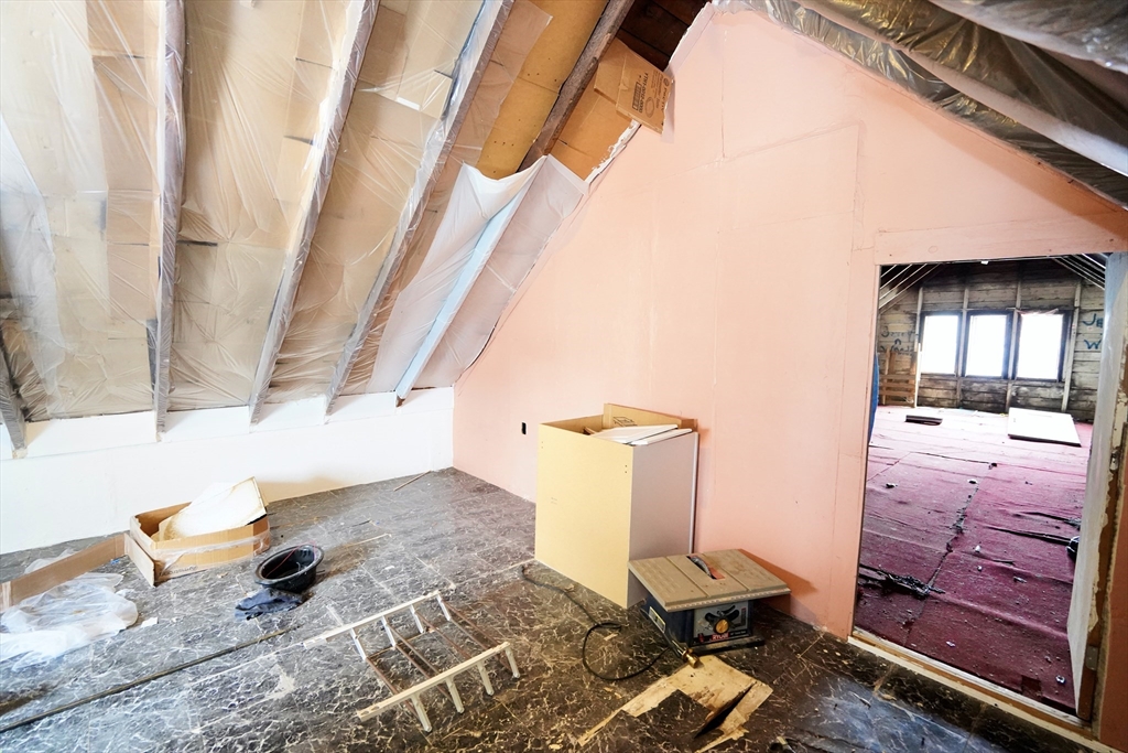 183 Farnham Street Lawrence, MA 01843 - Photo 21 of 38 a bedroom with a bed and a window