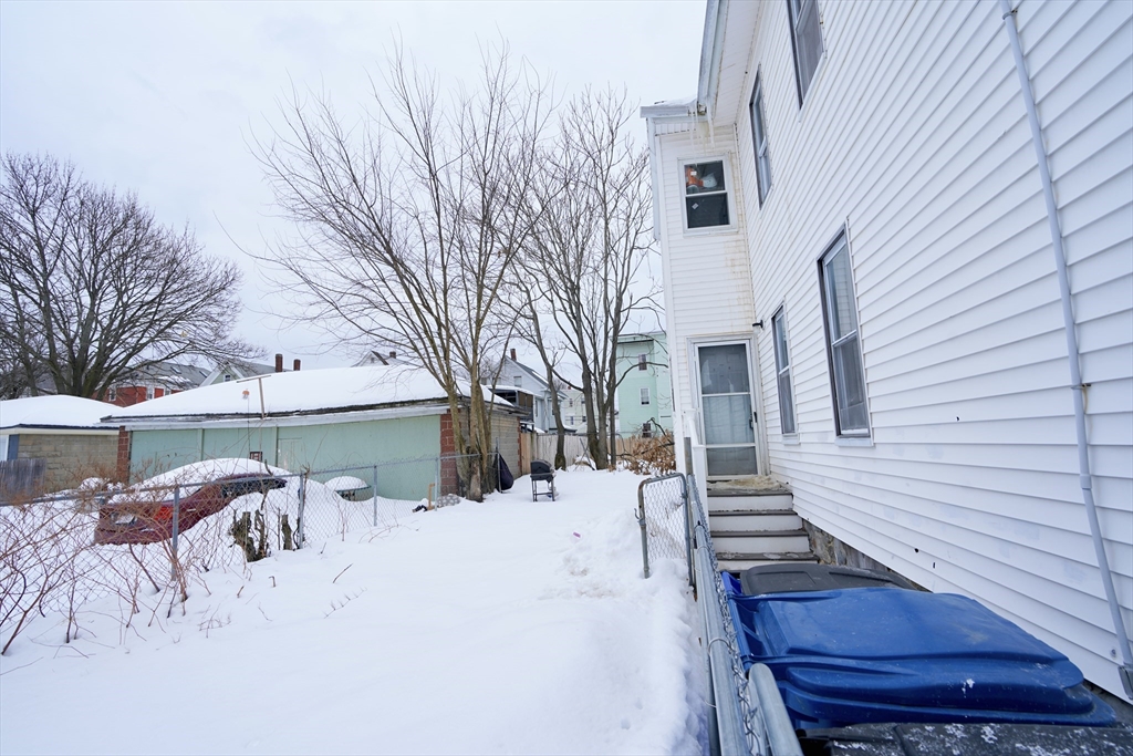 183 Farnham Street Lawrence, MA 01843 - Photo 36 of 38 a view of a patio with a yard