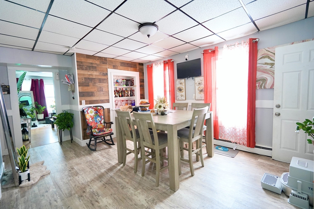 183 Farnham Street Lawrence, MA 01843 - Photo 4 of 38 a view of a dining room with furniture window and outside view