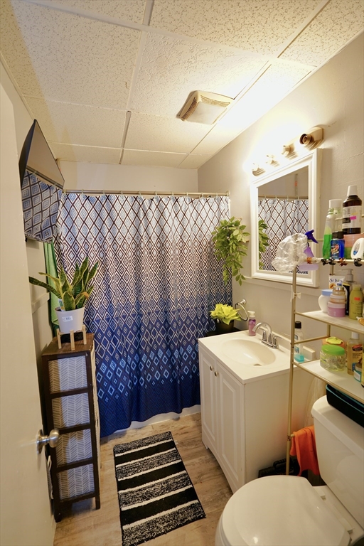 183 Farnham Street Lawrence, MA 01843 - Photo 9 of 38 a bathroom with a sink toilet and shower