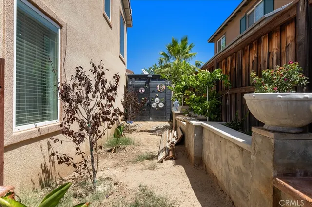a view of balcony with furniture